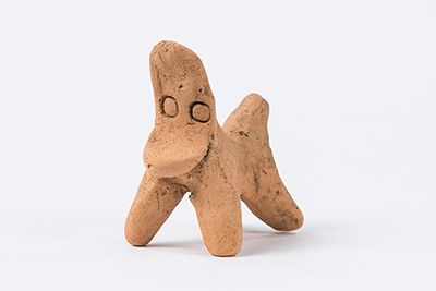 Horse-shaped clay figurine